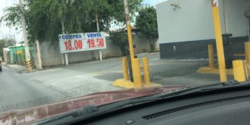 Ligera recuperación de peso-dólar