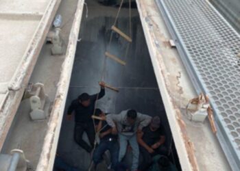 Rescatan a mujer indocumentada de tolva de granos de tren