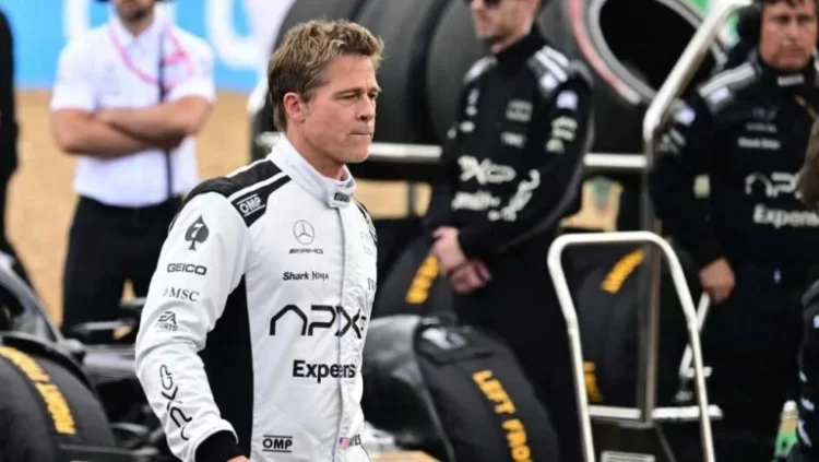 Brad Pitt roba atención durante entrevista de Checo Pérez